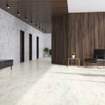 White marble and dark wooden elevator hall in an office with a panoramic window. There are three black doors in the wall and a brown armchair. 3d rendering mock up