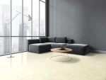 Dark living room with large window, black corner sofa and coffee table with laptop, side view. Sofa on marble floor and lamp, window with city view, 3D rendering no people